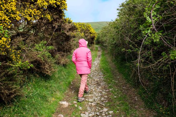 jen walking away on path