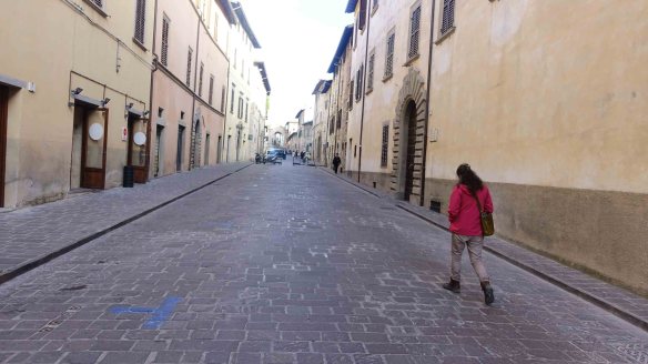 Jen walking down Gubbio street
