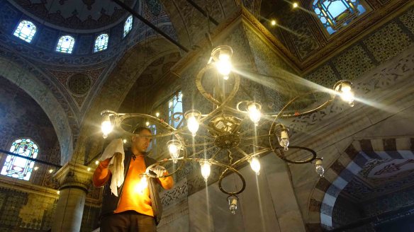 Changing lightbulb in Blue Mosque
